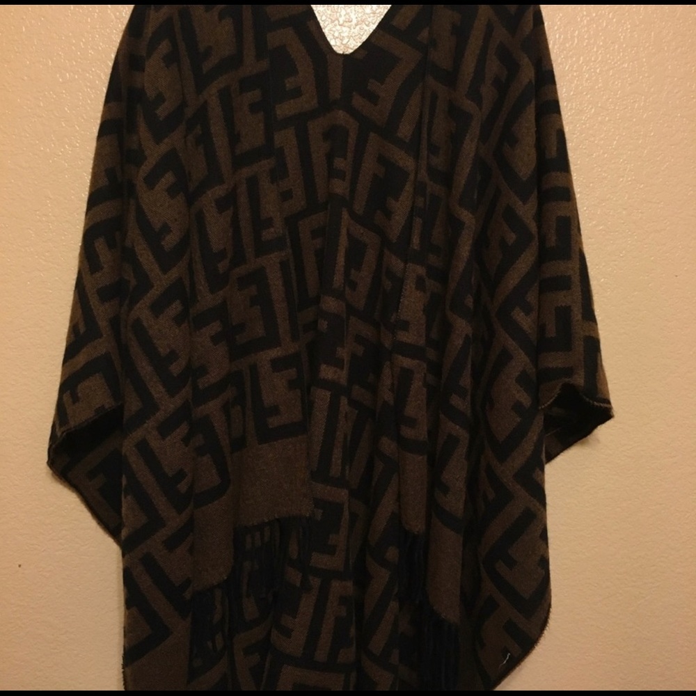 Fendi fringe poncho.